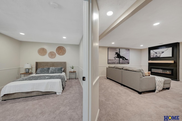 6833 Summerset Ct, Lincoln, NE 68516 - bedroom featuring carpet, a glass covered fireplace, and recessed lighting