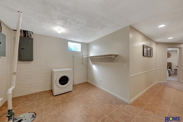 6833 Summerset Ct, Lincoln, NE 68516 - laundry room with washer / clothes dryer, electric panel, light tile patterned floors, recessed lighting, and a textured ceiling