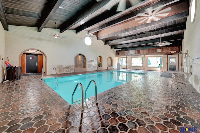 6833 Summerset Ct, Lincoln, NE 68516 - indoor community pool featuring ceiling fan and arched walkways