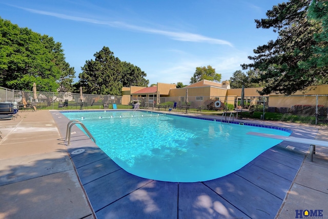6833 Summerset Ct, Lincoln, NE 68516 - community pool featuring a patio