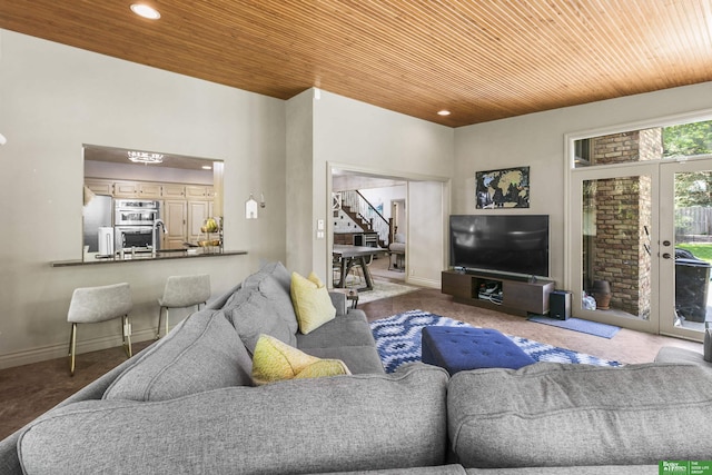 1015 N 127th Cir, Omaha, NE 68154 - carpeted living room featuring wooden ceiling, stairs, and recessed lighting