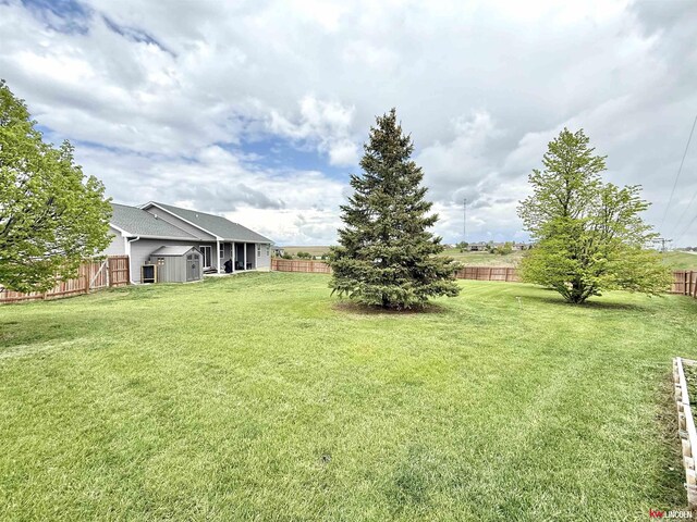 120 Snow Valley Cir, Palmyra, NE 68418 - fenced backyard featuring a shed