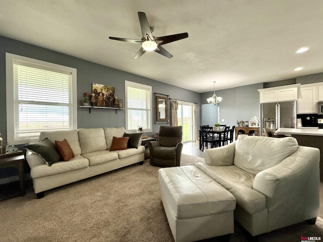 120 Snow Valley Cir, Palmyra, NE 68418 - living area featuring a chandelier, ceiling fan, recessed lighting, and light carpet
