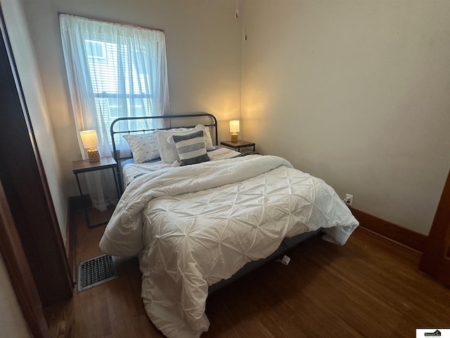 624 A St, Lincoln, NE 68502 - bedroom with wood finished floors and baseboards