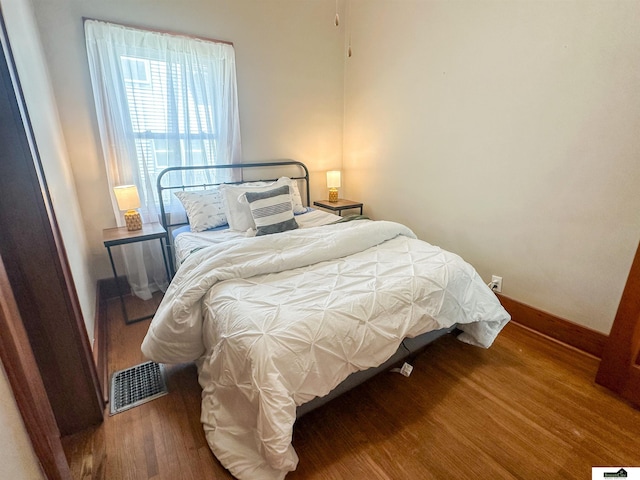 624 A St, Lincoln, NE 68502 - bedroom with wood finished floors and baseboards
