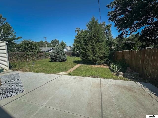 624 A St, Lincoln, NE 68502 - fenced backyard featuring a patio