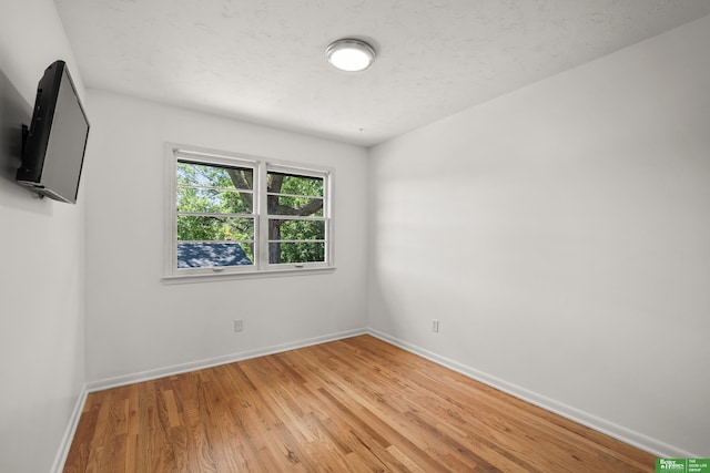 2330 S 90th St, Omaha, NE 68124 - unfurnished room featuring light wood-type flooring and baseboards