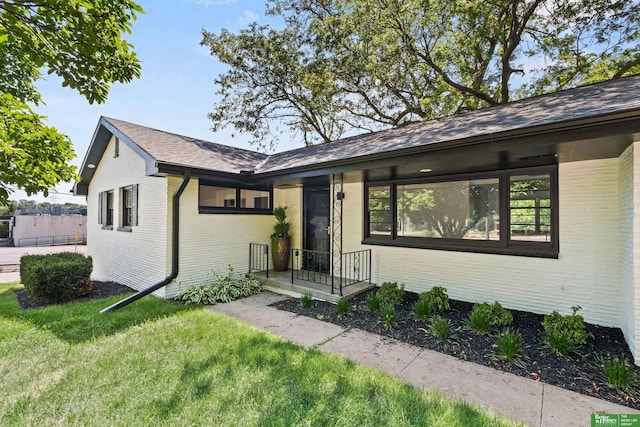 2330 S 90th St, Omaha, NE 68124 - ranch-style house featuring brick siding and roof with shingles