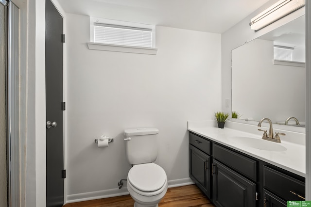 2330 S 90th St, Omaha, NE 68124 - bathroom featuring vanity and wood finished floors