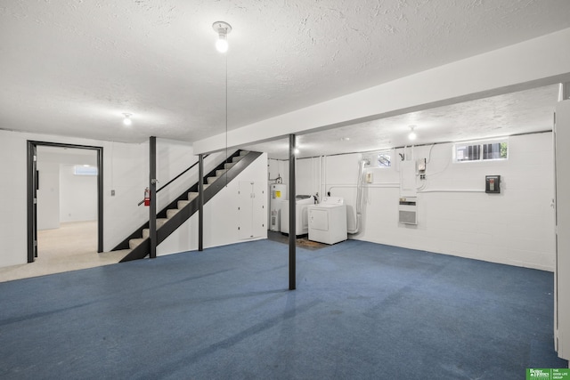 2330 S 90th St, Omaha, NE 68124 - basement with washing machine and dryer, electric water heater, a textured ceiling, stairway, and concrete block wall