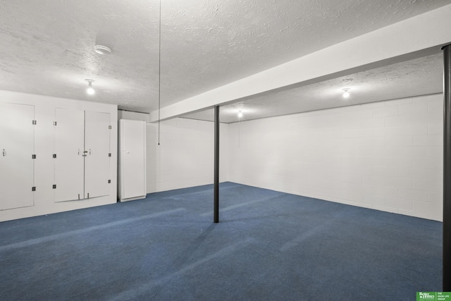 2330 S 90th St, Omaha, NE 68124 - finished basement featuring a textured ceiling, carpet flooring, and concrete block wall