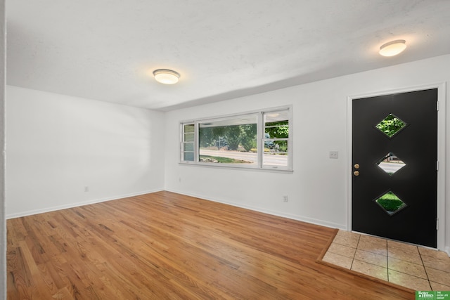 2330 S 90th St, Omaha, NE 68124 - entryway with wood finished floors and baseboards