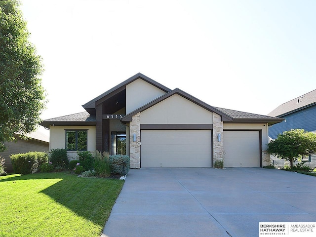 6535 N 157th St, Omaha, NE 68116 - view of front of property featuring an attached garage, stucco siding, driveway, a front lawn, and stone siding