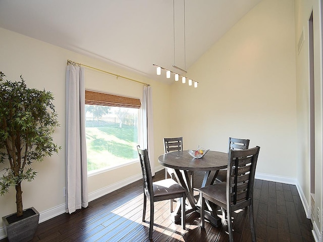 6535 N 157th St, Omaha, NE 68116 - dining room with dark wood-style floors and lofted ceiling