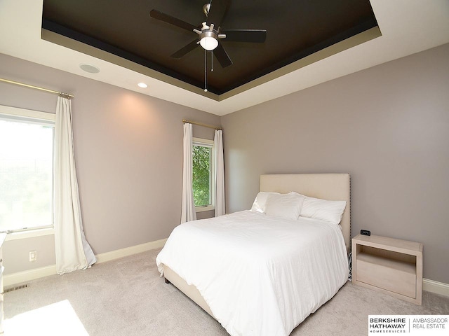 6535 N 157th St, Omaha, NE 68116 - bedroom featuring a raised ceiling, light colored carpet, a ceiling fan, and recessed lighting
