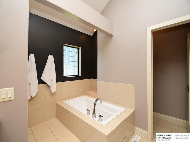 6535 N 157th St, Omaha, NE 68116 - bathroom featuring a bath and tile patterned flooring