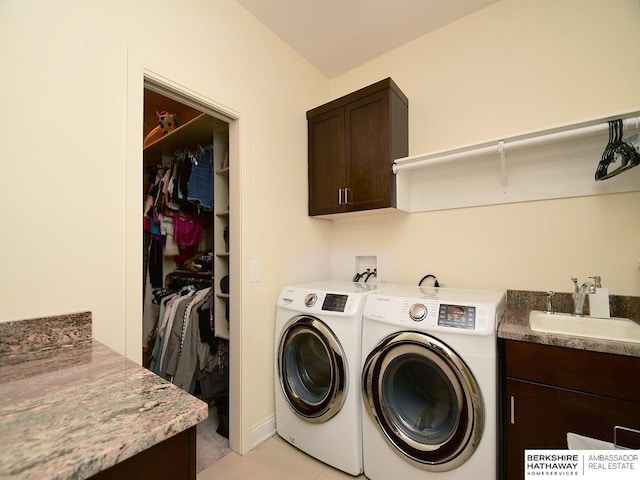 6535 N 157th St, Omaha, NE 68116 - washroom featuring cabinet space and washing machine and dryer