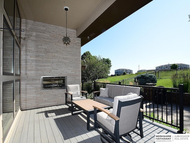 6535 N 157th St, Omaha, NE 68116 - wooden deck with an outdoor hangout area