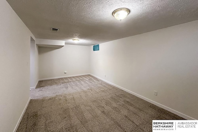7025 S 41st St, Bellevue, NE 68147 - finished basement with carpet floors and a textured ceiling