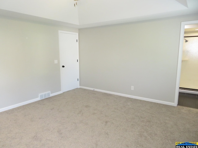 933 N 150th St, Omaha, NE 68154 - spare room featuring carpet flooring and a baseboard heating unit