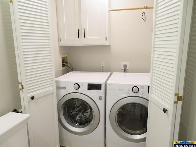 933 N 150th St, Omaha, NE 68154 - laundry room featuring cabinet space and independent washer and dryer