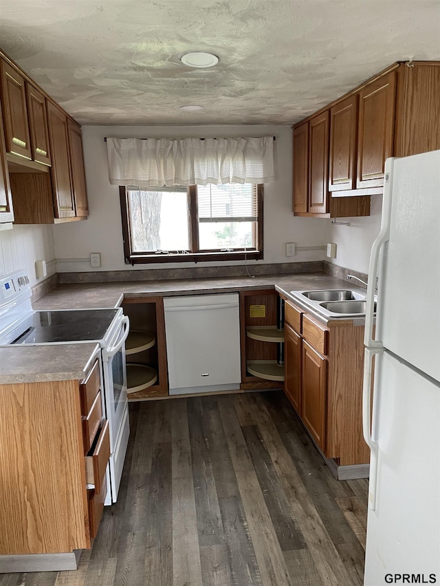 1327 N Cedar Ave, Hastings, NE 68901 - kitchen with white appliances, open shelves, and brown cabinetry