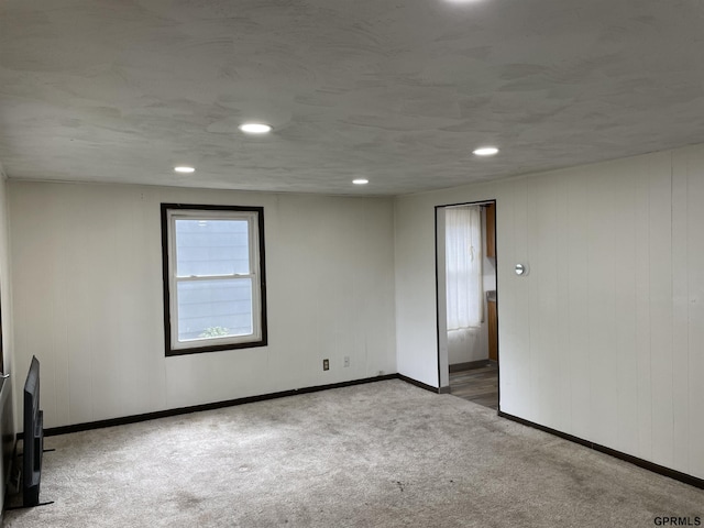 1327 N Cedar Ave, Hastings, NE 68901 - empty room with carpet floors and recessed lighting