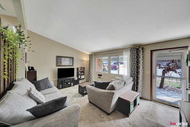 8032 E Avon Ln, Lincoln, NE 68505 - living area featuring lofted ceiling and light carpet