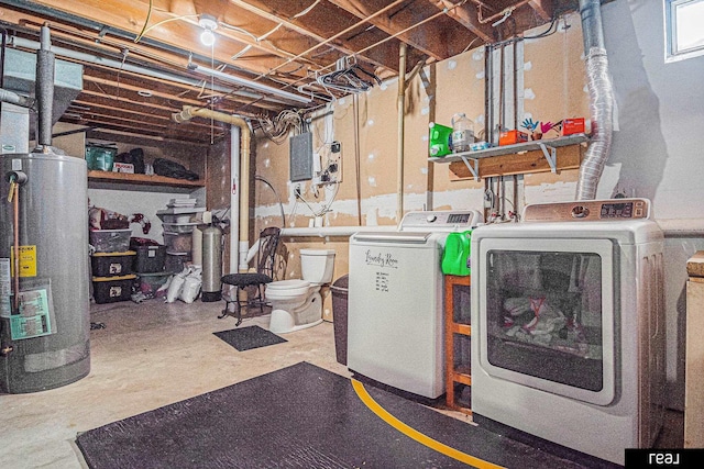 549 Washtington St, Carson, IA 51525 - unfinished basement featuring washer and clothes dryer, gas water heater, and a water softener