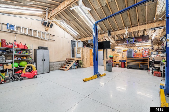 549 Washtington St, Carson, IA 51525 - garage featuring a workshop area