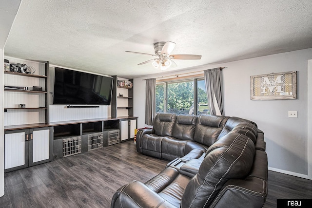 549 Washtington St, Carson, IA 51525 - living area featuring ceiling fan, a textured ceiling, and dark wood-type flooring