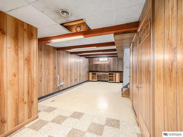 9418 Meredith Ave, Omaha, NE 68134 - basement with wood walls and light flooring