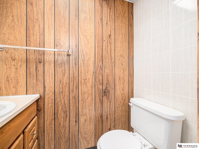9418 Meredith Ave, Omaha, NE 68134 - half bathroom with vanity and tile walls