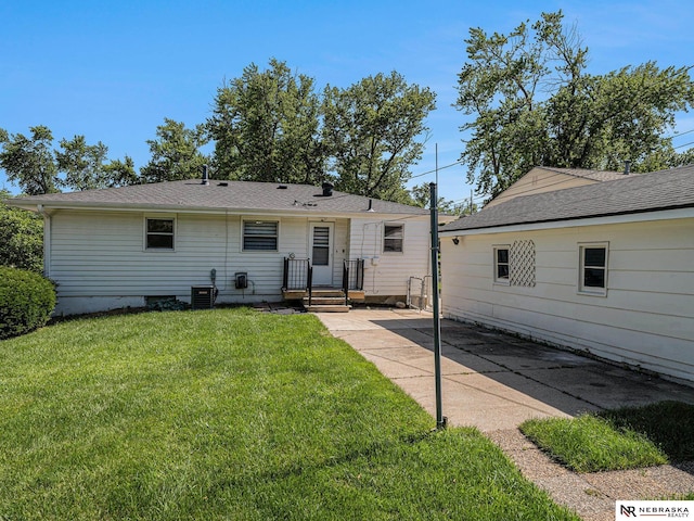 9418 Meredith Ave, Omaha, NE 68134 - back of property featuring a yard