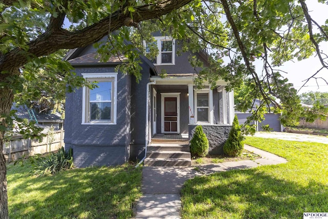 6316 Spencer St, Omaha, NE 68104 - view of front of home featuring stucco siding and roof with shingles