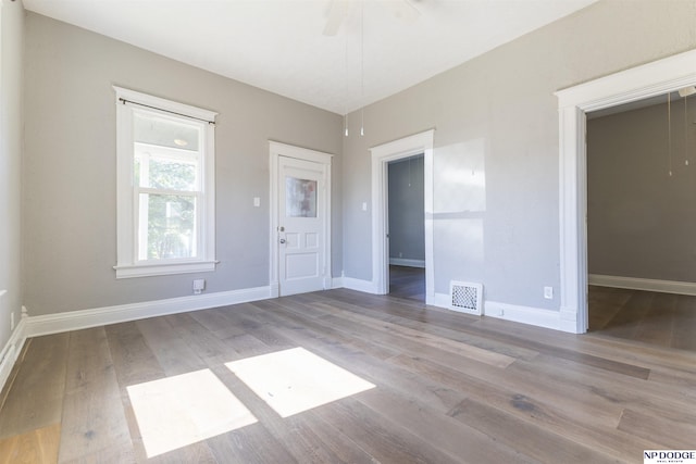 6316 Spencer St, Omaha, NE 68104 - unfurnished room with wood finished floors and ceiling fan
