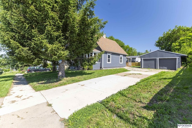 6316 Spencer St, Omaha, NE 68104 - view of front of home featuring a garage and a front yard