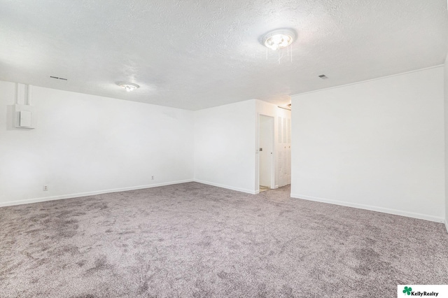 13229 Glenn St, Omaha, NE 68138 - spare room featuring carpet and a textured ceiling