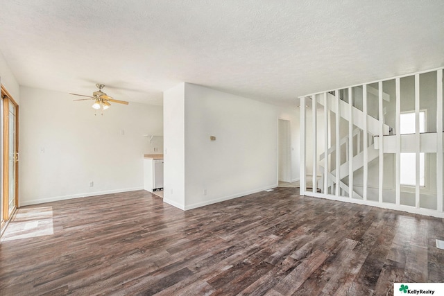 13229 Glenn St, Omaha, NE 68138 - empty room featuring dark wood finished floors, ceiling fan, and a textured ceiling