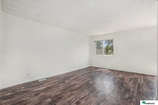 13229 Glenn St, Omaha, NE 68138 - unfurnished room featuring dark wood-style flooring
