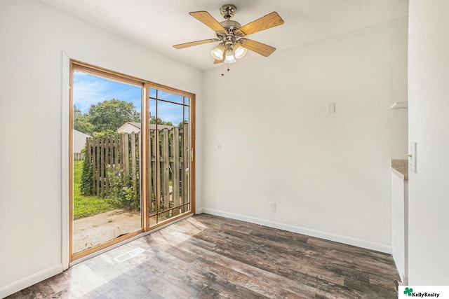 13229 Glenn St, Omaha, NE 68138 - empty room with wood finished floors and a ceiling fan