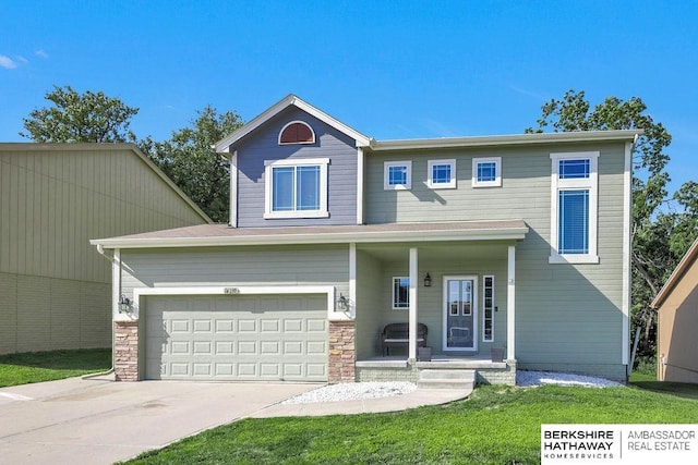 14210 Potter Pkwy, Omaha, NE 68142 - traditional-style house with concrete driveway, a garage, covered porch, and a front lawn