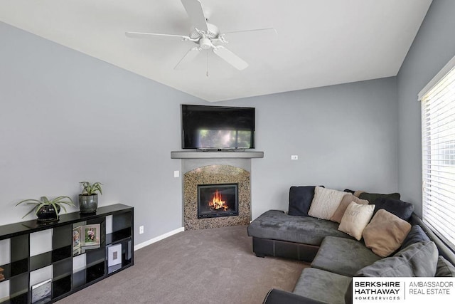 14210 Potter Pkwy, Omaha, NE 68142 - living area with carpet floors, a tile fireplace, ceiling fan, and vaulted ceiling