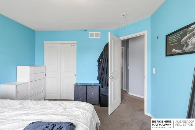 14210 Potter Pkwy, Omaha, NE 68142 - carpeted bedroom featuring a closet and baseboards