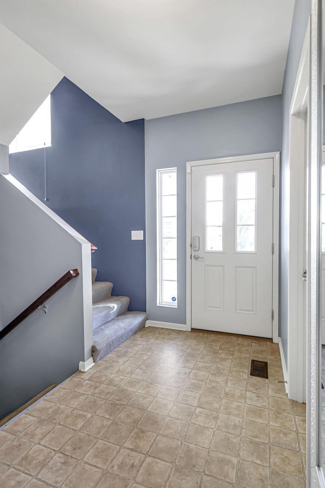 14210 Potter Pkwy, Omaha, NE 68142 - entrance foyer with baseboards and stairs