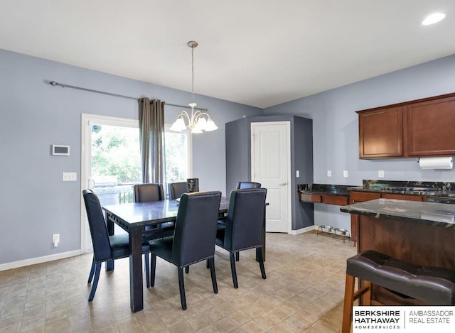 14210 Potter Pkwy, Omaha, NE 68142 - dining room featuring a chandelier and baseboards