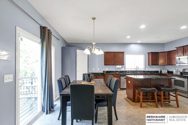 14210 Potter Pkwy, Omaha, NE 68142 - dining area featuring a chandelier and recessed lighting
