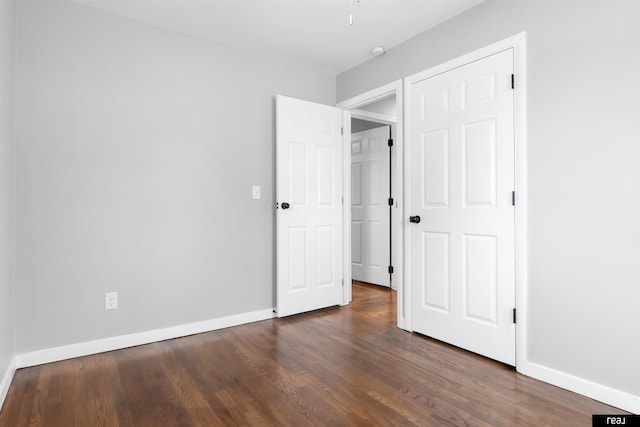12529 C St, Omaha, NE 68144 - unfurnished bedroom featuring wood finished floors
