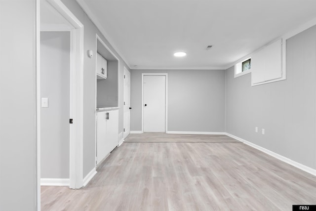 12529 C St, Omaha, NE 68144 - basement with baseboards and light wood finished floors