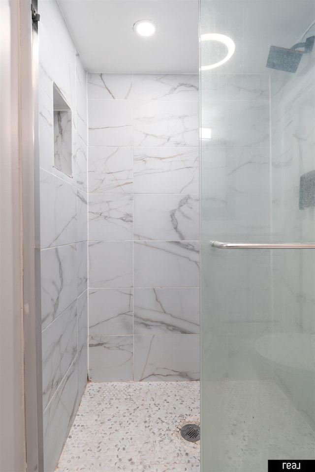12529 C St, Omaha, NE 68144 - bathroom featuring a shower stall and recessed lighting